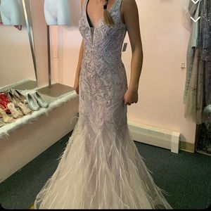 light purple/pink 
only wore once 
altered, but can be reverted to size 0